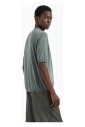 pull-en-tricot-vert-a-manches-courtes