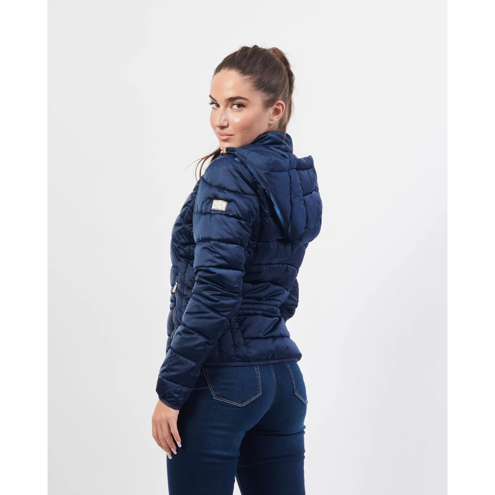 YES ZEE Blauwe gewatteerde regenjas met capuchon Blue Dames