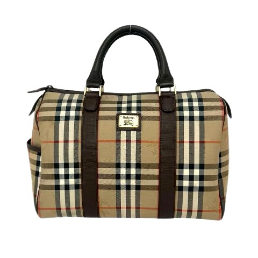 Shop fashion from Burberry Vintage online on Miinto