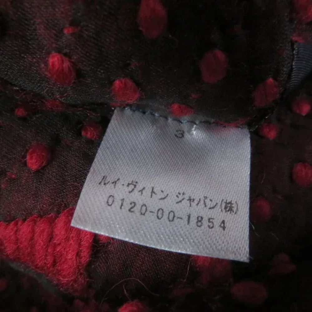 Louis Vuitton Vintage Pre-owned Wool scarves Red Dames