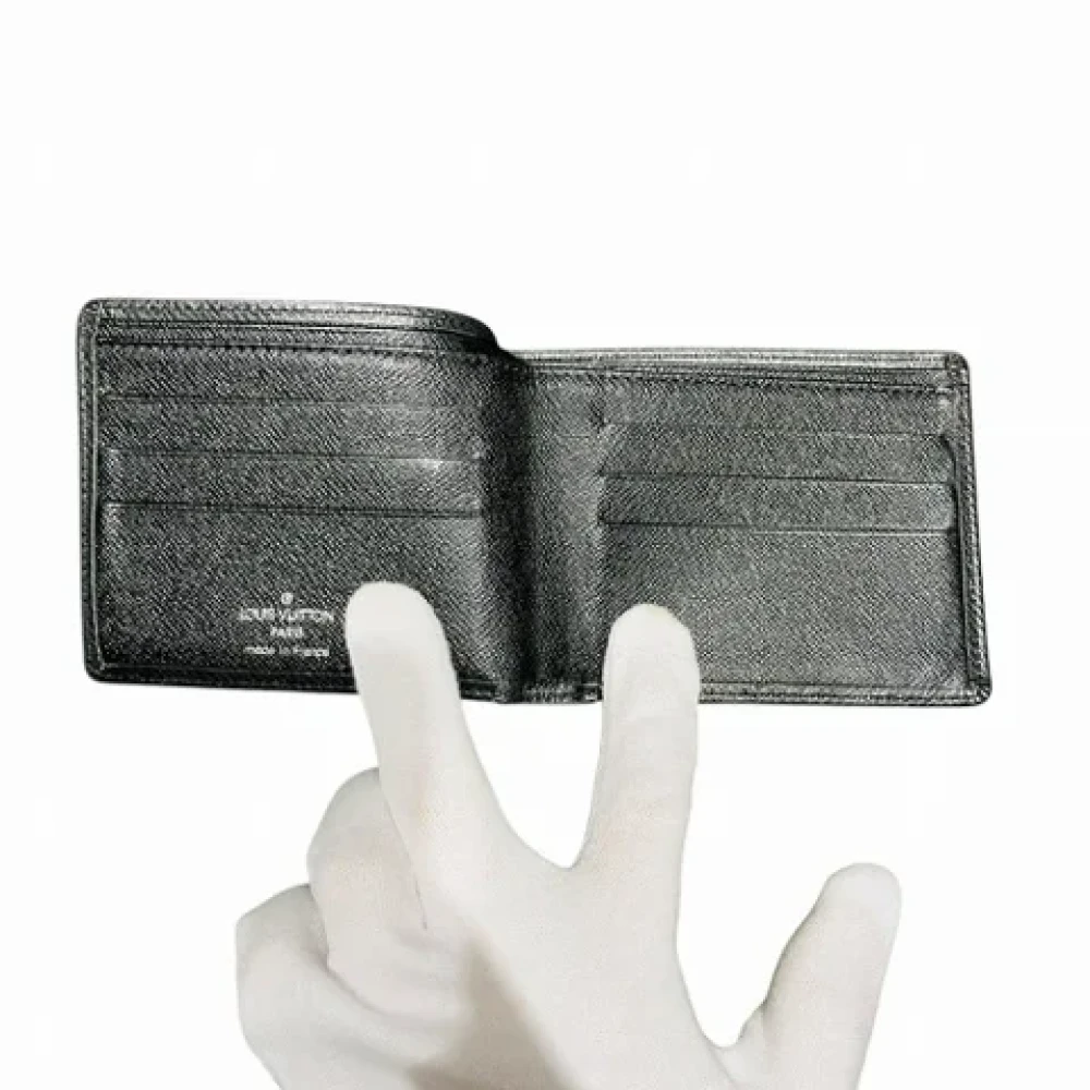 Louis Vuitton Vintage Pre-owned Leather wallets Black Heren