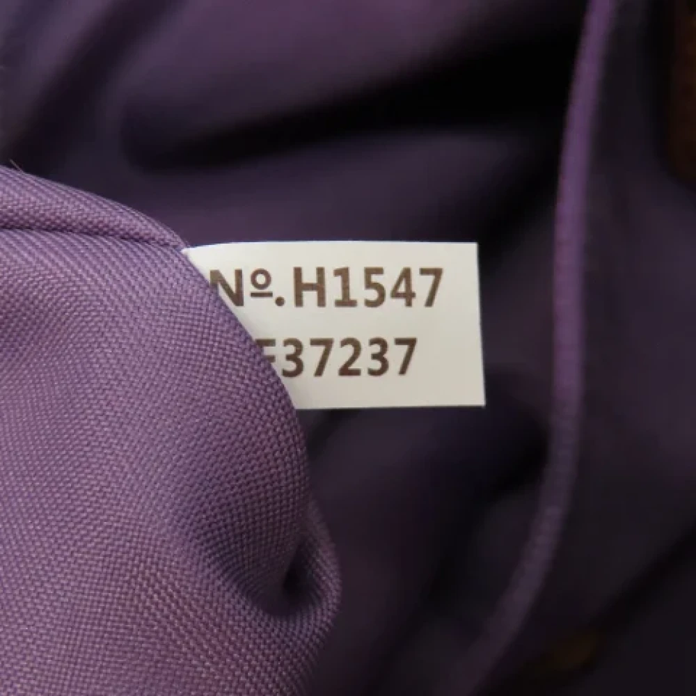 Coach Pre-owned Canvas handbags Purple Dames
