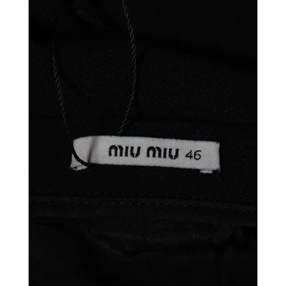Miu Pre-owned Fabric bottoms Black Dames