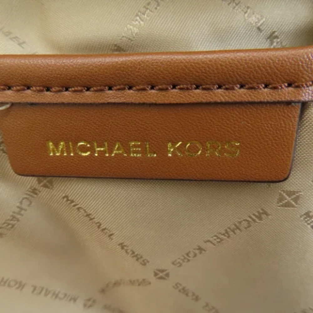 Michael Kors Pre-owned Plastic backpacks Brown Dames