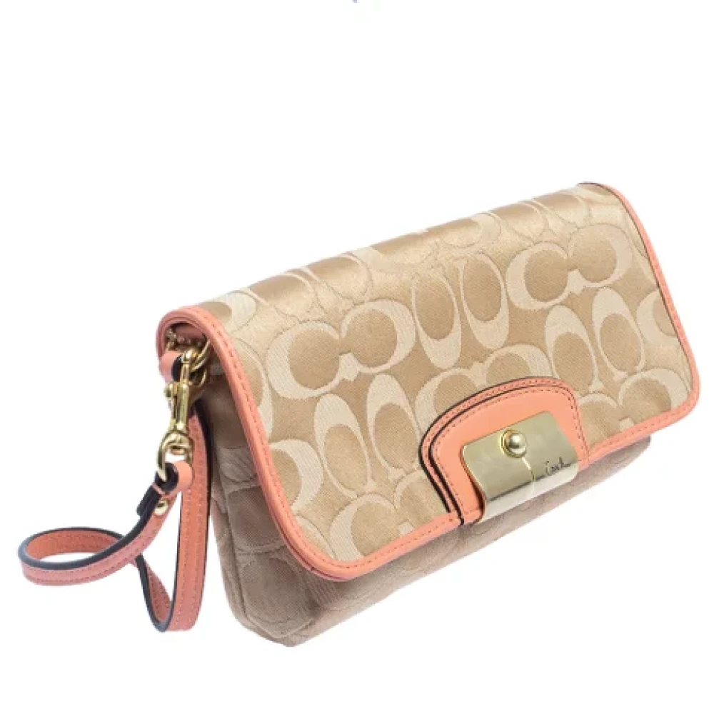 Coach Pre-owned Canvas clutches Beige Dames