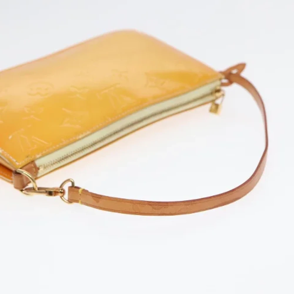 Louis Vuitton Vintage Pre-owned Leather clutches Yellow Dames