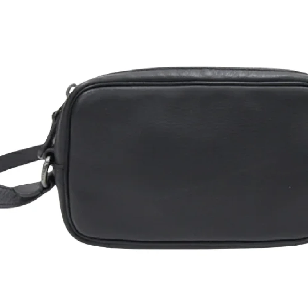 Coach Pre-owned Leather clutches Black Dames