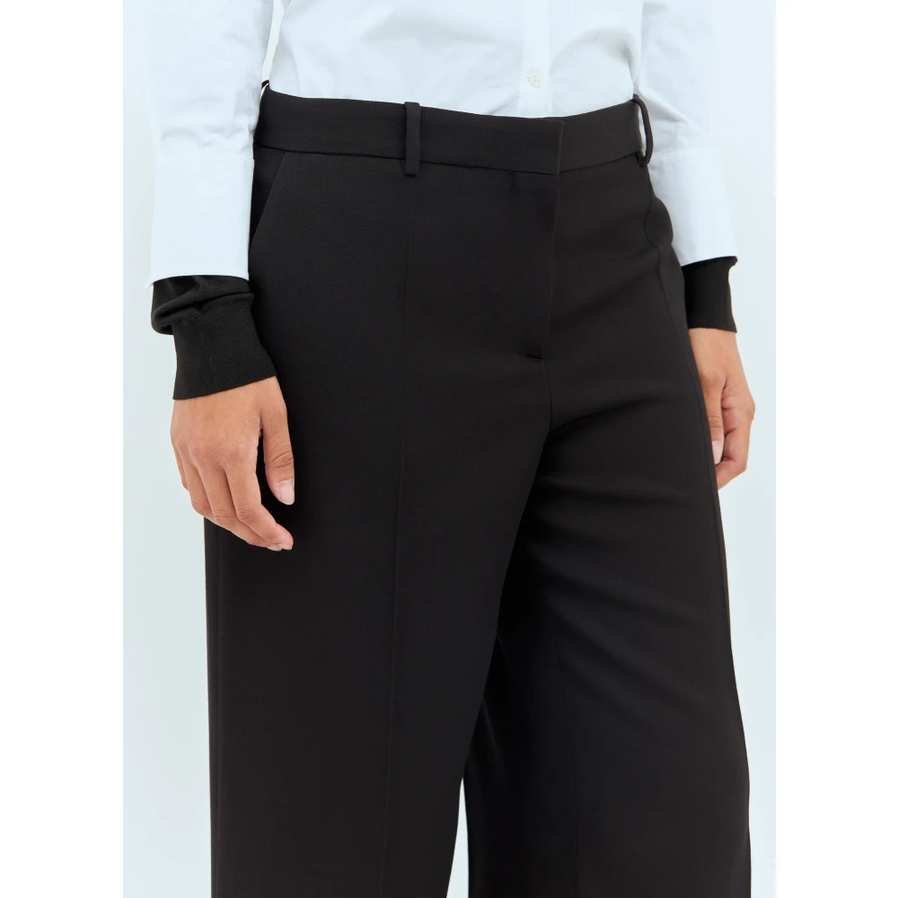 The Row Wollen op maat gemaakte broek met persplooien Black Dames