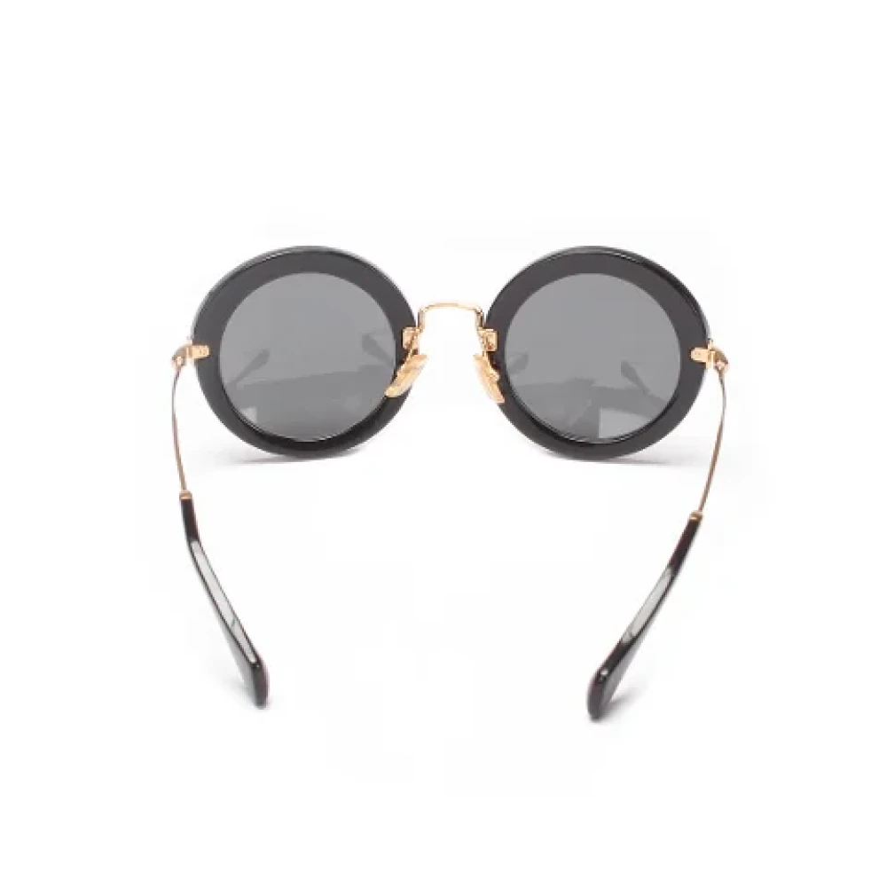 Miu Pre-owned Metal sunglasses Black Dames