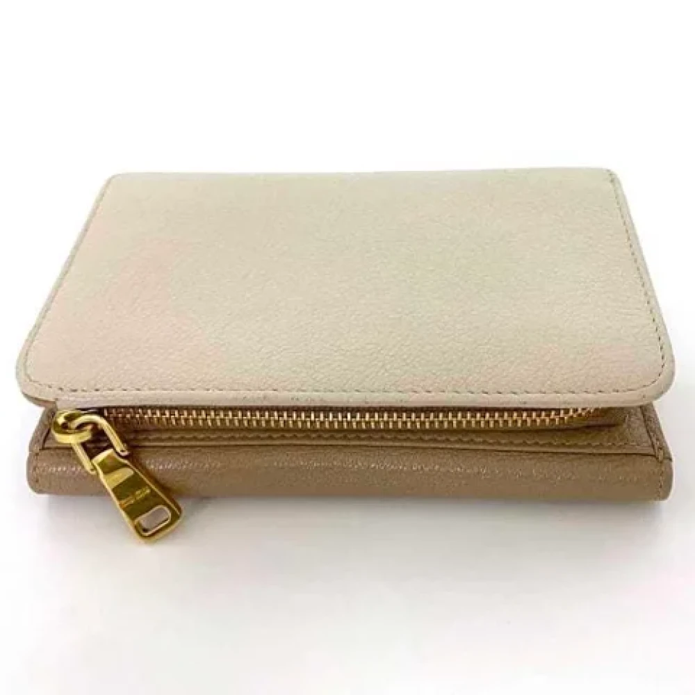 Miu Pre-owned Leather wallets Beige Dames