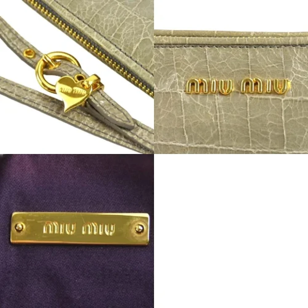 Miu Pre-owned Fabric clutches Beige Dames