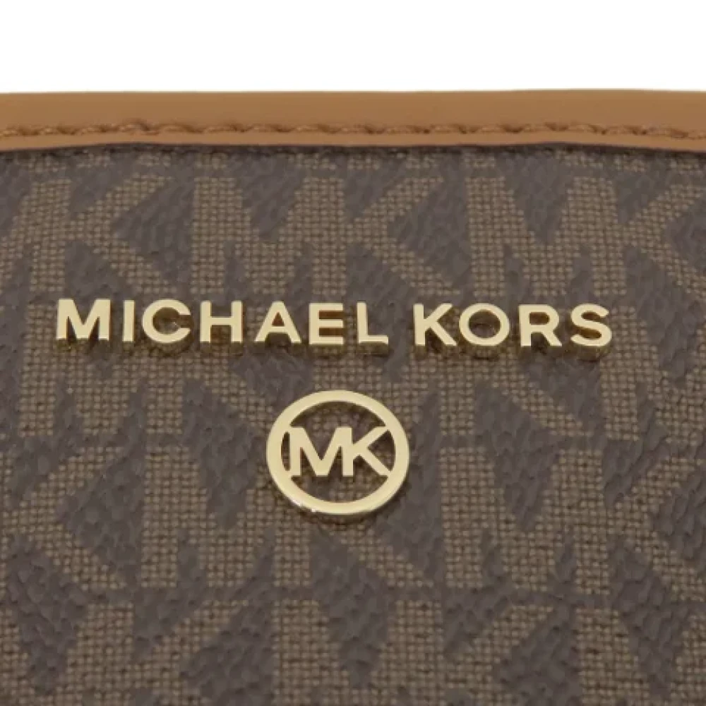 Michael Kors Pre-owned Plastic handbags Brown Dames