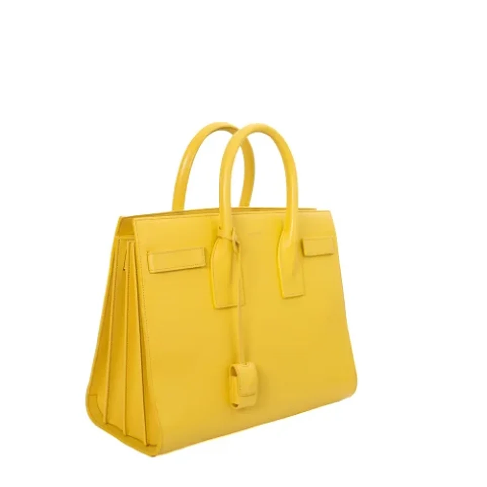 Yves Saint Laurent Vintage Pre-owned Leather handbags Yellow Dames