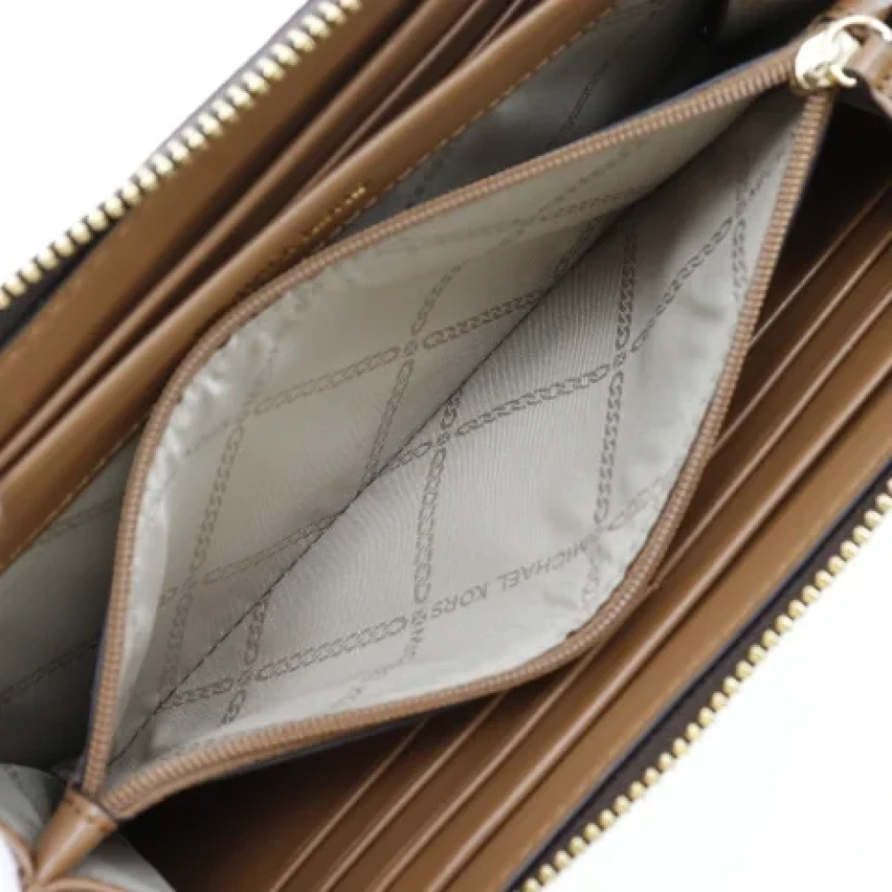 Michael Kors Pre-owned Leather wallets Brown Dames