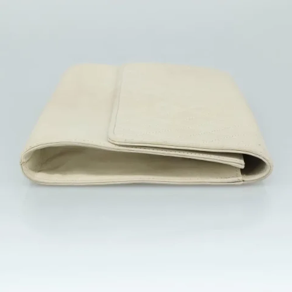 Saint Laurent Vintage Pre-owned Leather clutches Beige Dames