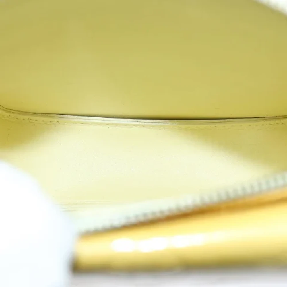 Louis Vuitton Vintage Pre-owned Leather clutches Yellow Dames