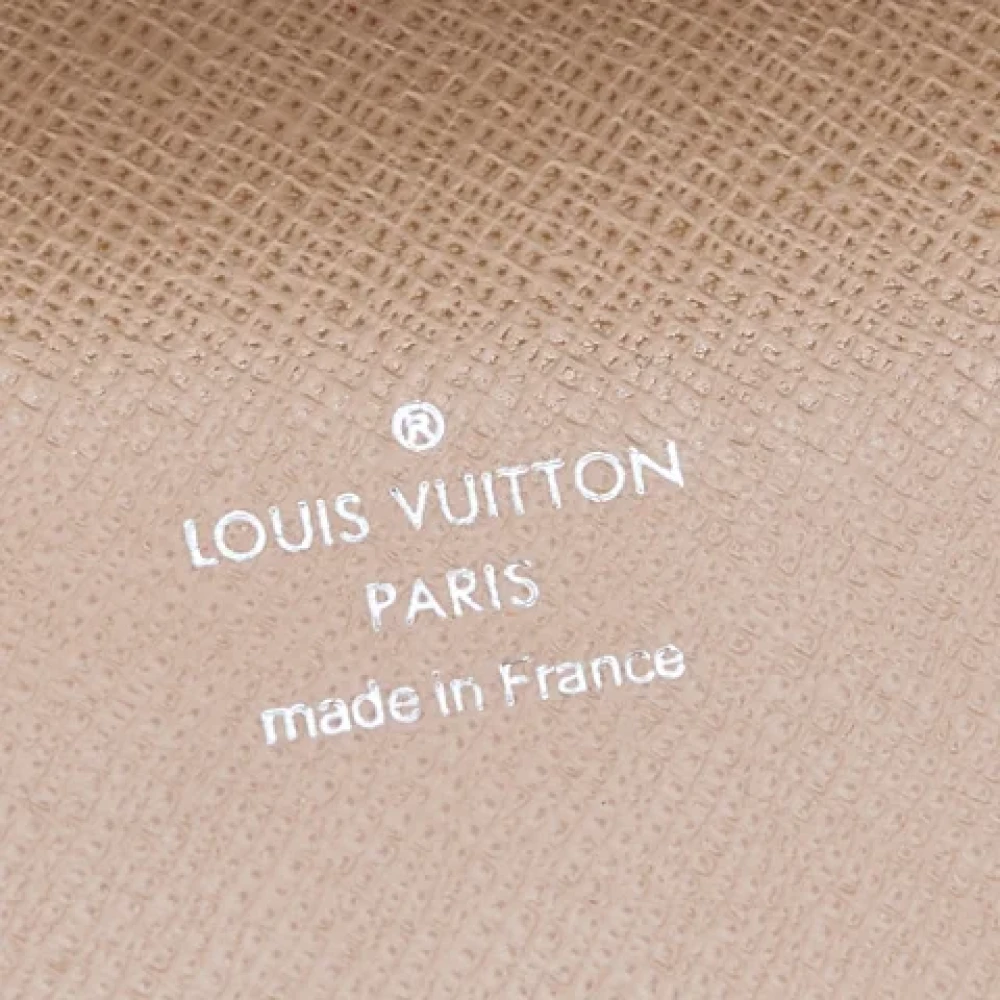 Louis Vuitton Vintage Pre-owned Leather clutches Beige Dames