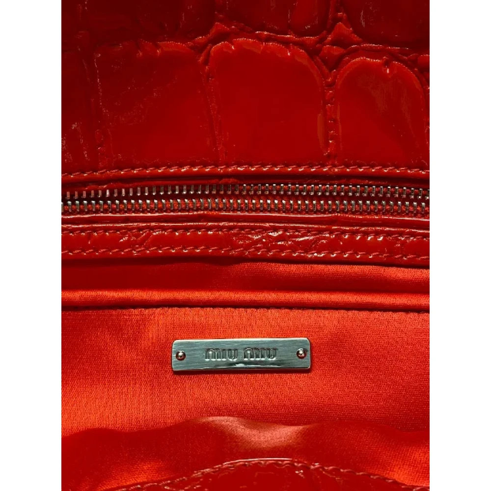 Miu Pre-owned Leather clutches Red Dames