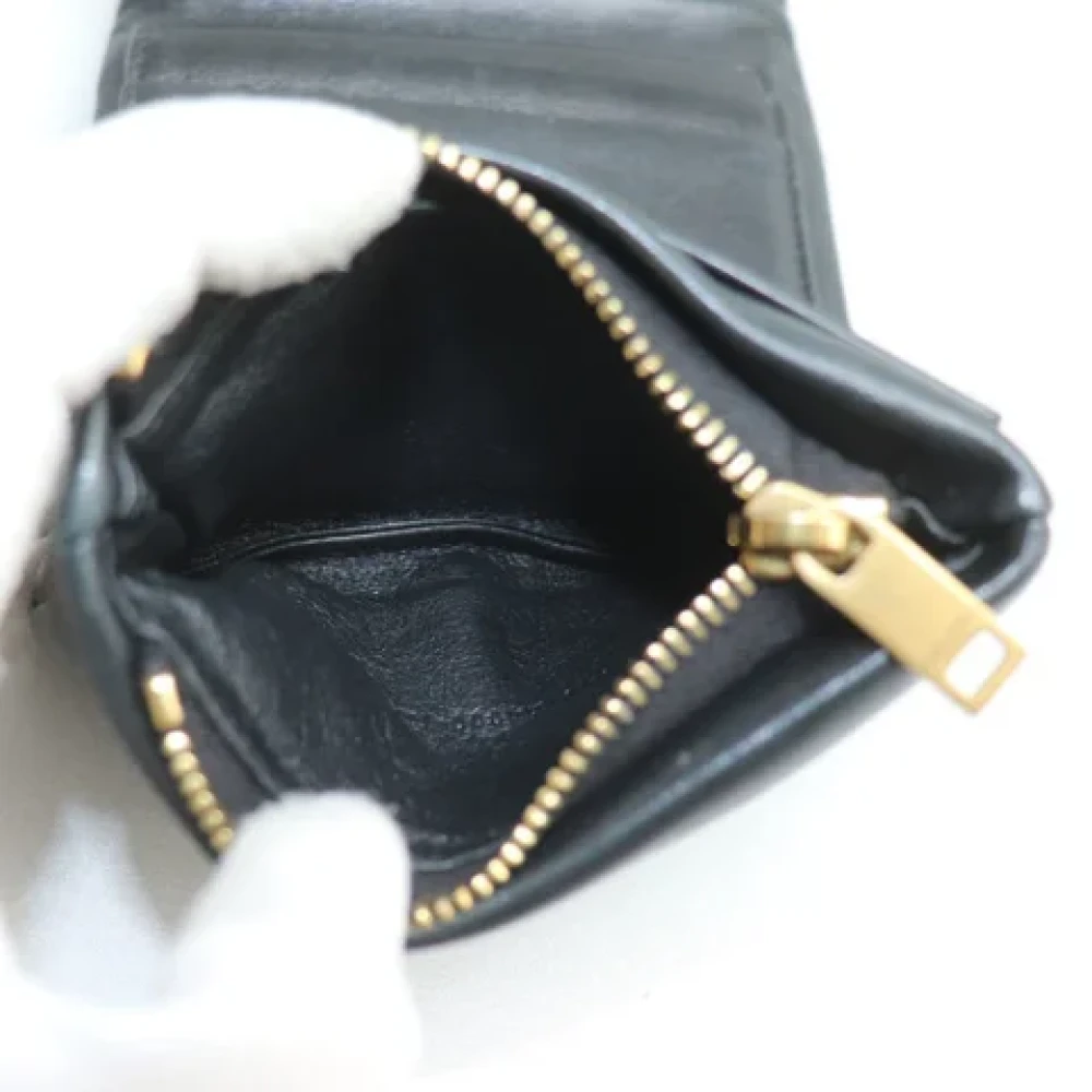 Yves Saint Laurent Vintage Pre-owned Leather wallets Black Dames