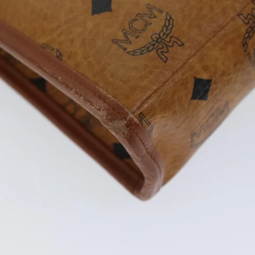 MCM Pre-owned Leather clutches Brown Dames