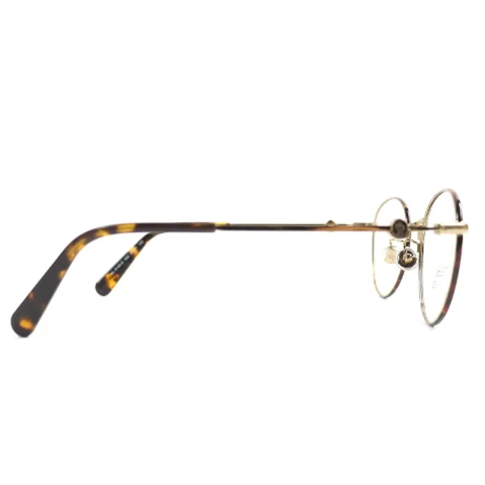 Moncler Pre-owned Metal sunglasses Brown Dames