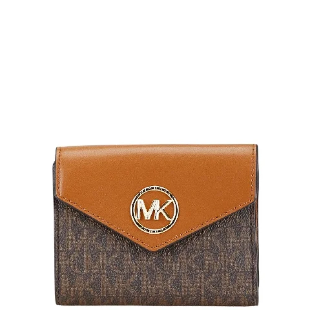 Michael Kors Pre-owned Canvas wallets Brown Dames
