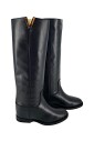 black-tubular-leather-boots-with-golden-v-detail