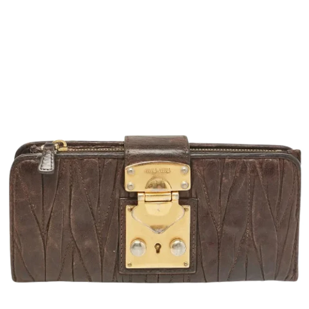 Miu Pre-owned Leather wallets Brown Dames