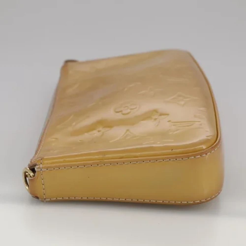 Louis Vuitton Vintage Pre-owned Leather pouches Beige Dames