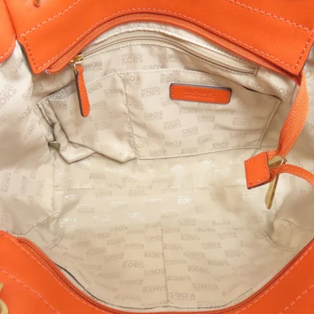 Michael Kors Pre-owned Plastic shoulder-bags Orange Dames