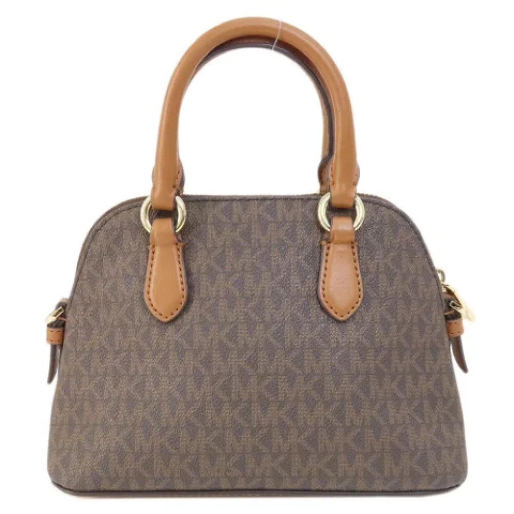 Michael Kors Pre-owned Plastic handbags Brown Dames