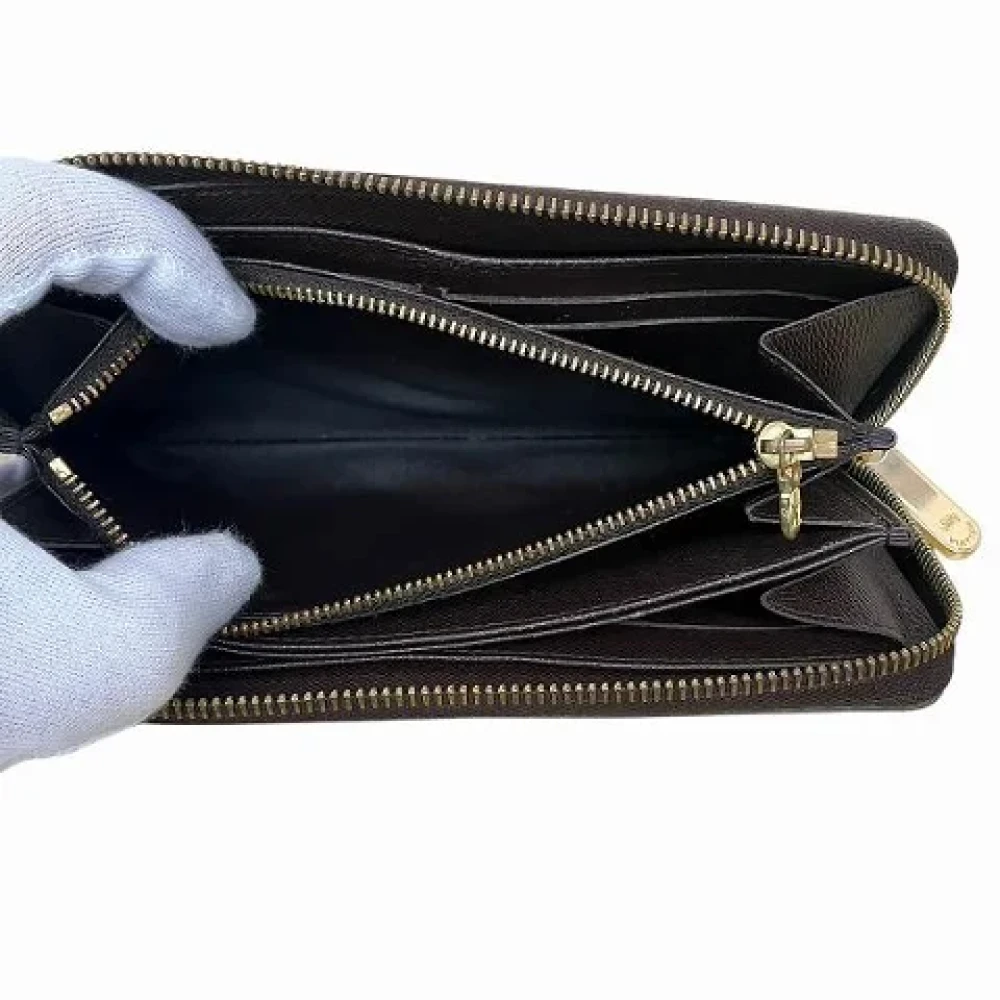 Louis Vuitton Vintage Pre-owned Canvas wallets Brown Dames