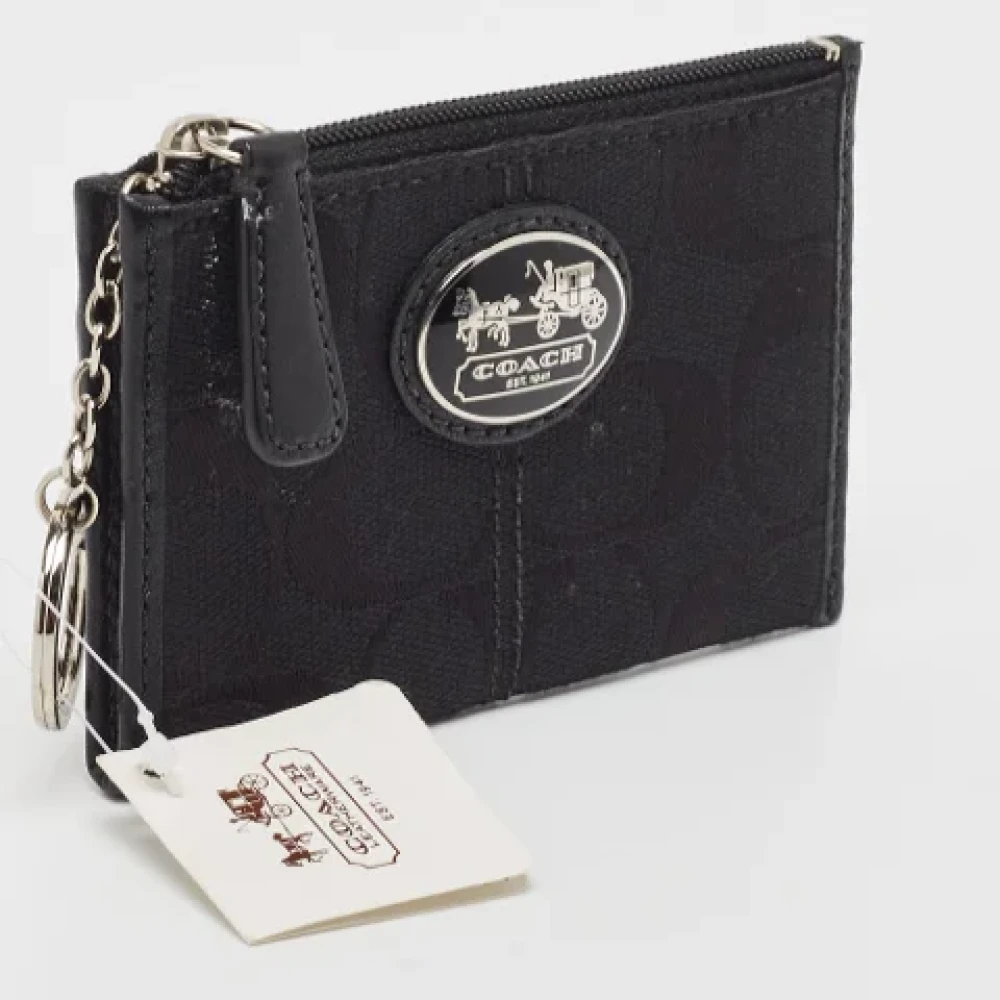 Coach Pre-owned Canvas wallets Black Dames