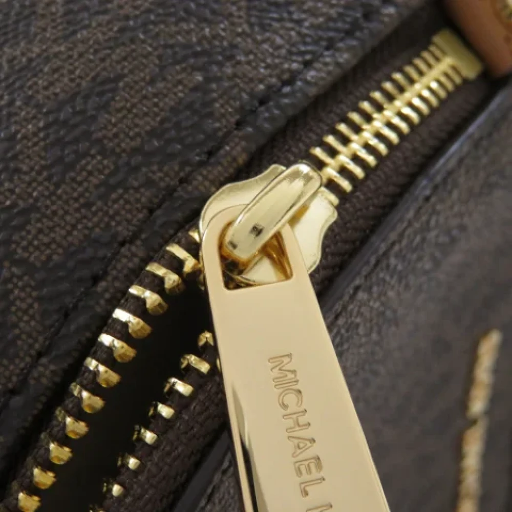 Michael Kors Pre-owned Plastic backpacks Brown Dames
