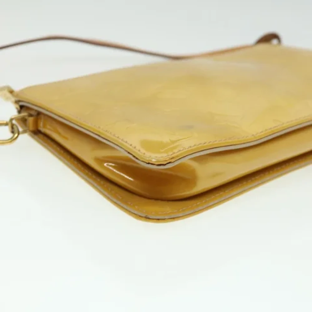 Louis Vuitton Vintage Pre-owned Leather clutches Beige Dames