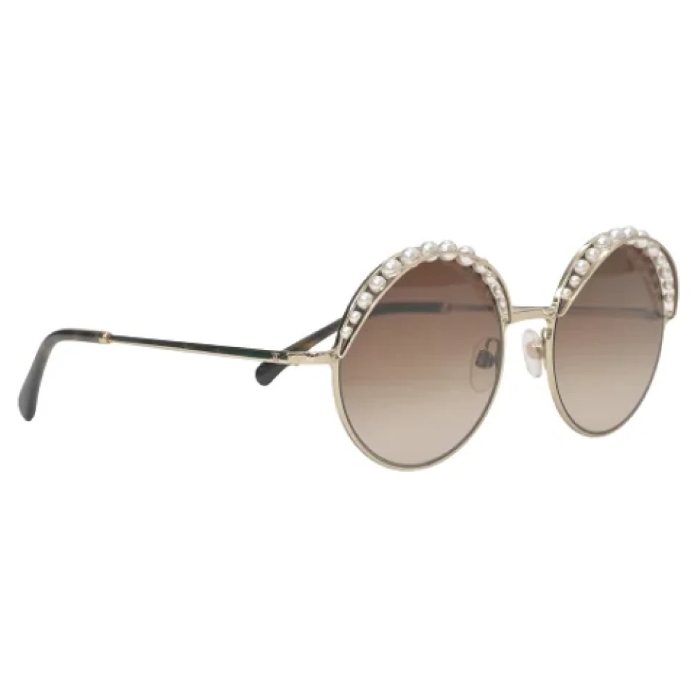Chanel Vintage Pre-owned Metal sunglasses Yellow Dames