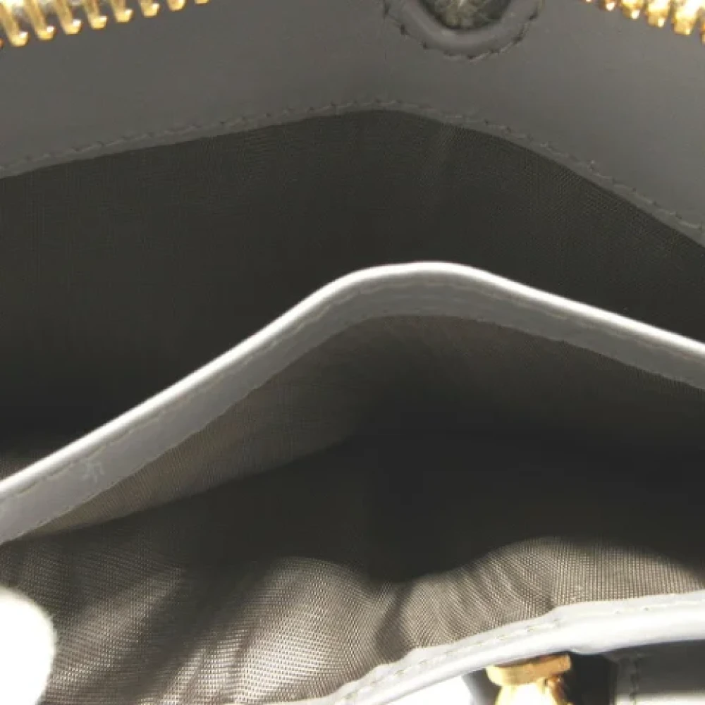 Miu Pre-owned Leather wallets Gray Dames