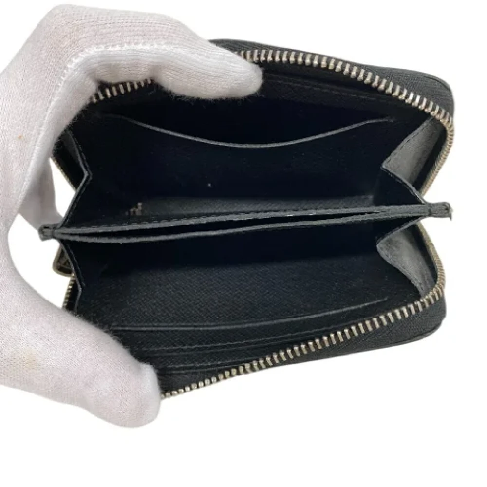 Louis Vuitton Vintage Pre-owned Leather wallets Black Heren