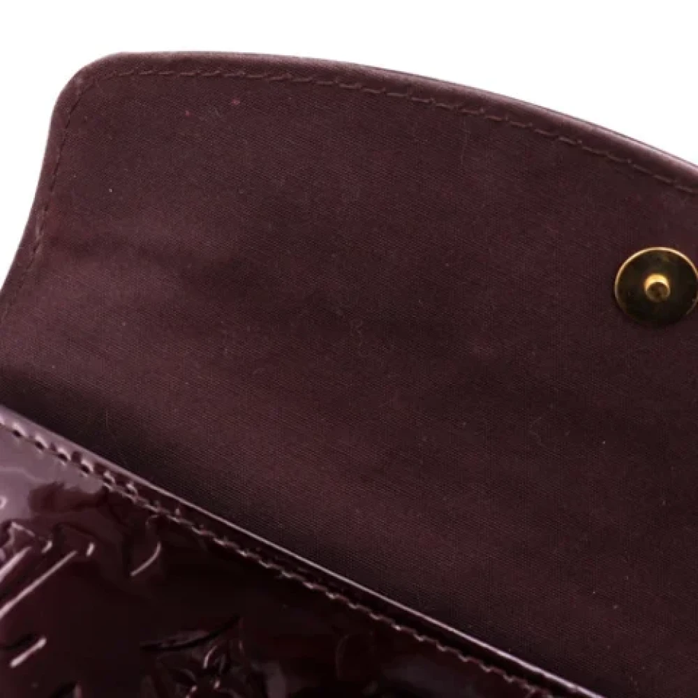 Louis Vuitton Vintage Pre-owned Leather clutches Purple Dames