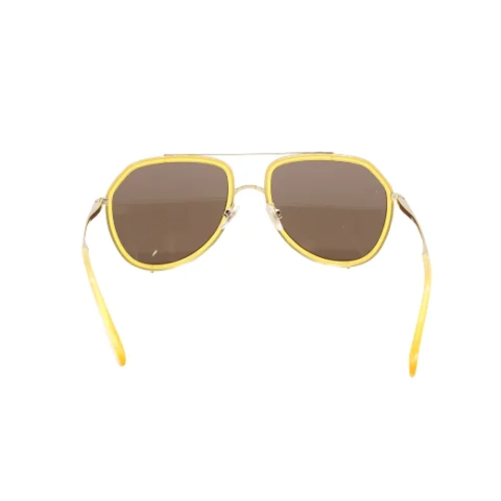 Dolce & Gabbana Pre-owned Metal sunglasses Yellow Dames