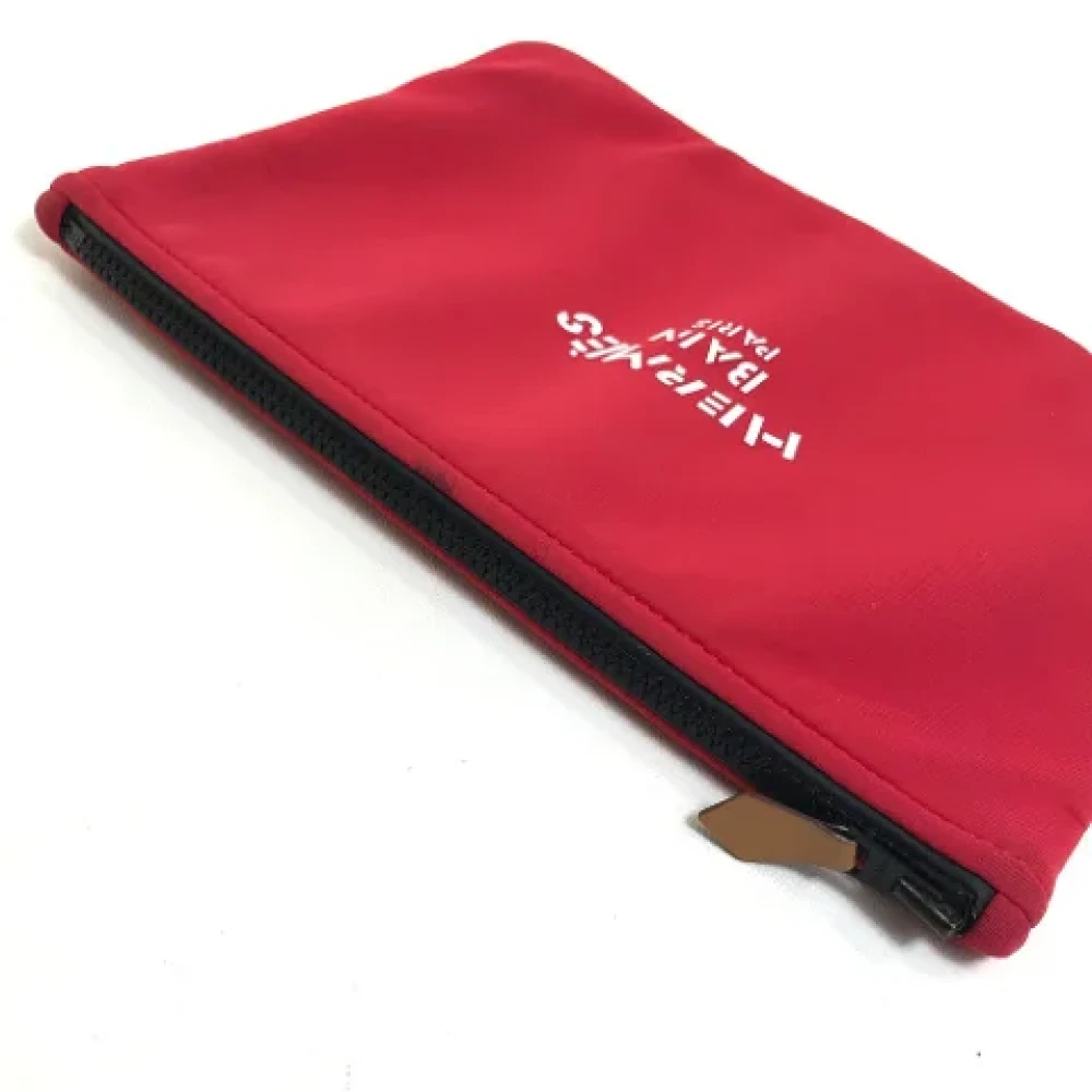 Hermès Vintage Pre-owned Fabric clutches Red Dames