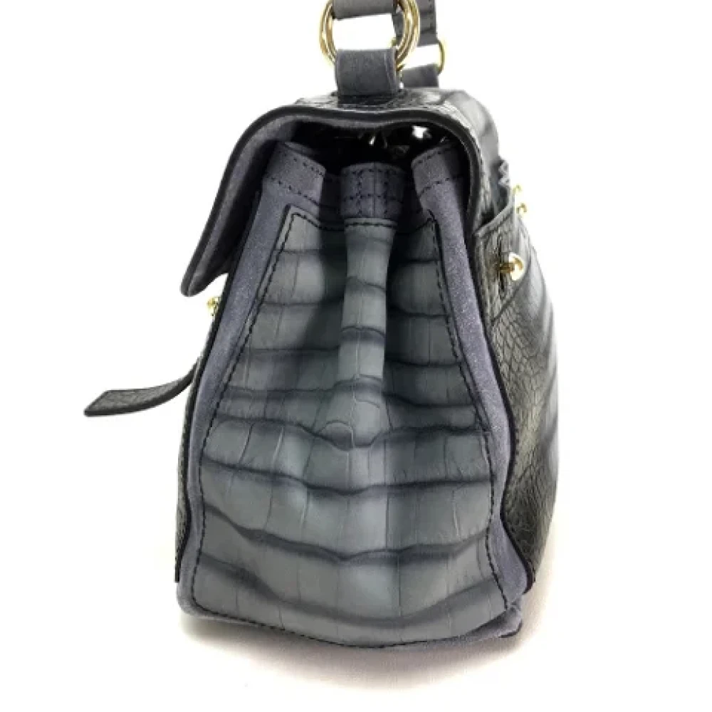 Yves Saint Laurent Vintage Pre-owned Canvas handbags Black Dames