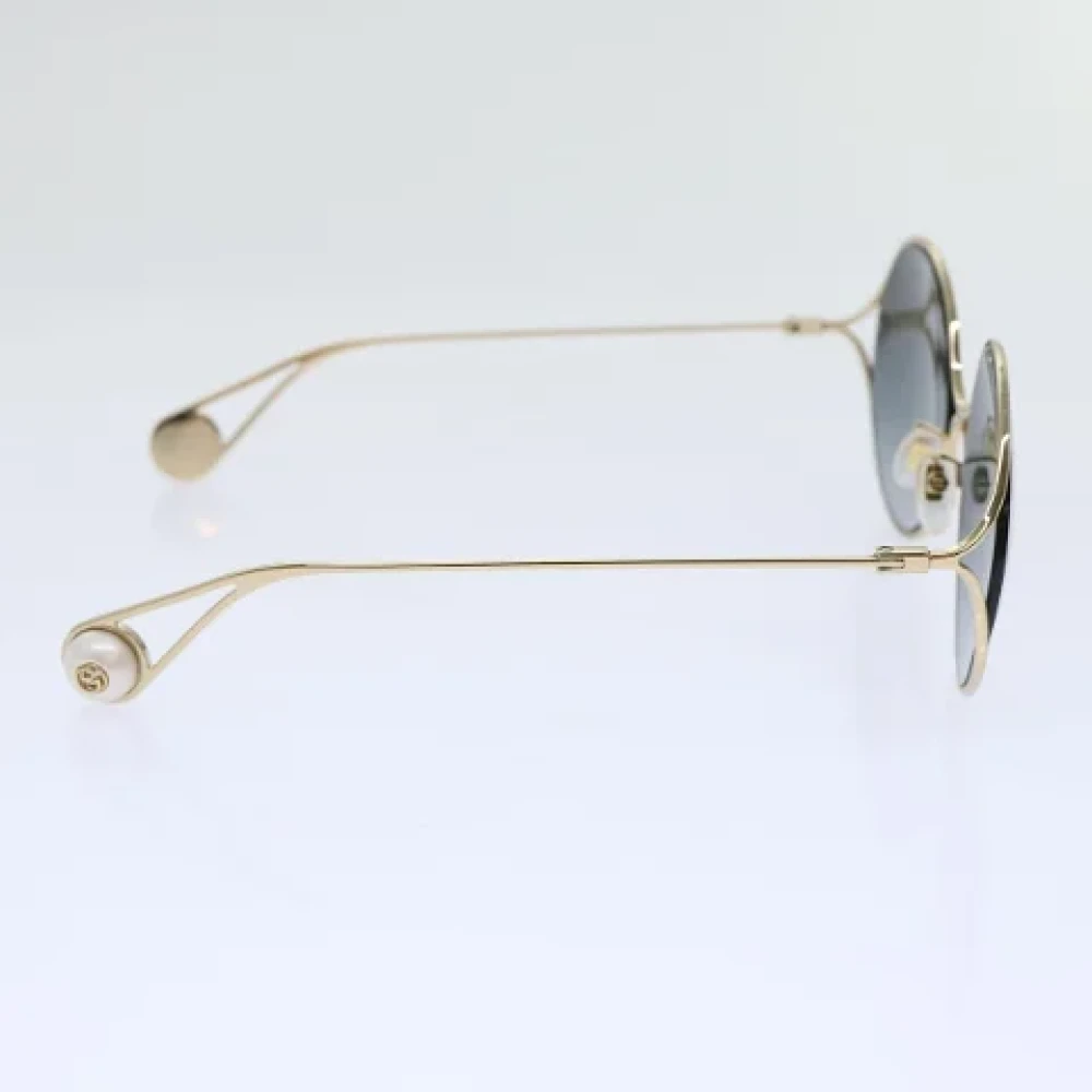 Gucci Vintage Pre-owned Metal sunglasses Yellow Dames