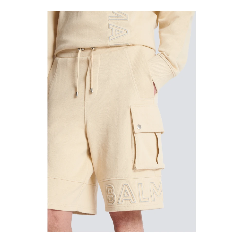Balmain Cargo shorts met reflecterend logo Beige Heren
