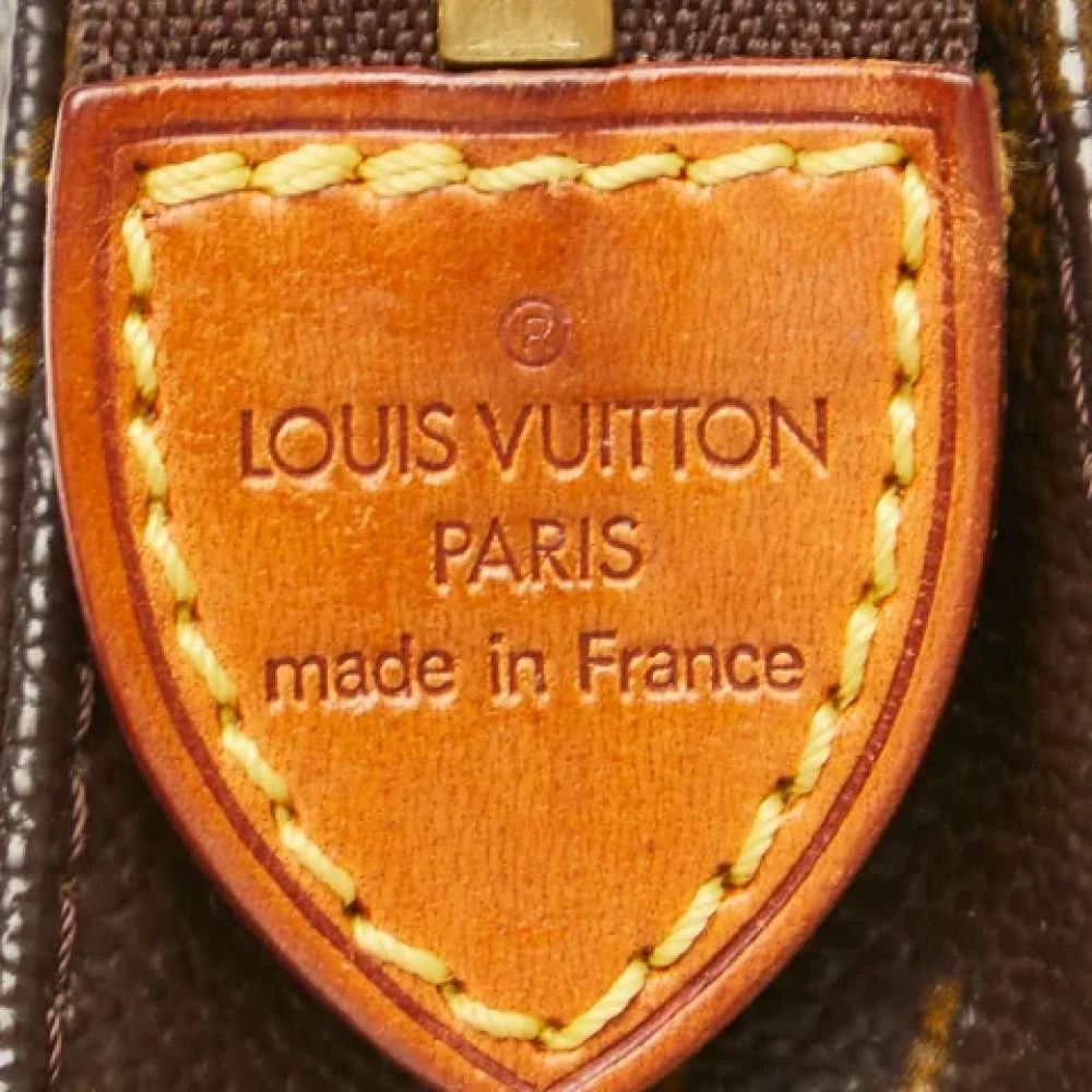 Louis Vuitton Vintage Pre-owned Plastic pouches Brown Dames