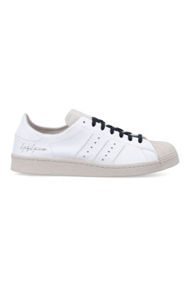 white-sneakers-with-rubber-shell-toe