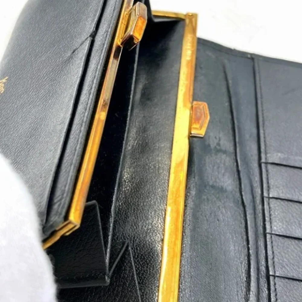Yves Saint Laurent Vintage Pre-owned Leather wallets Black Dames