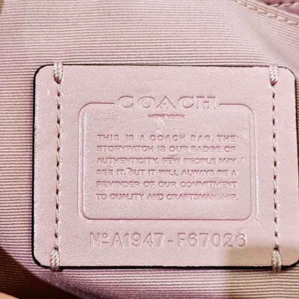 Coach Pre-owned Plastic handbags Beige Dames