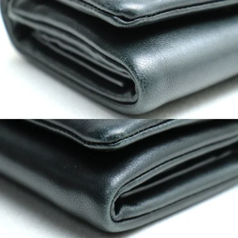 Yves Saint Laurent Vintage Pre-owned Leather wallets Black Dames