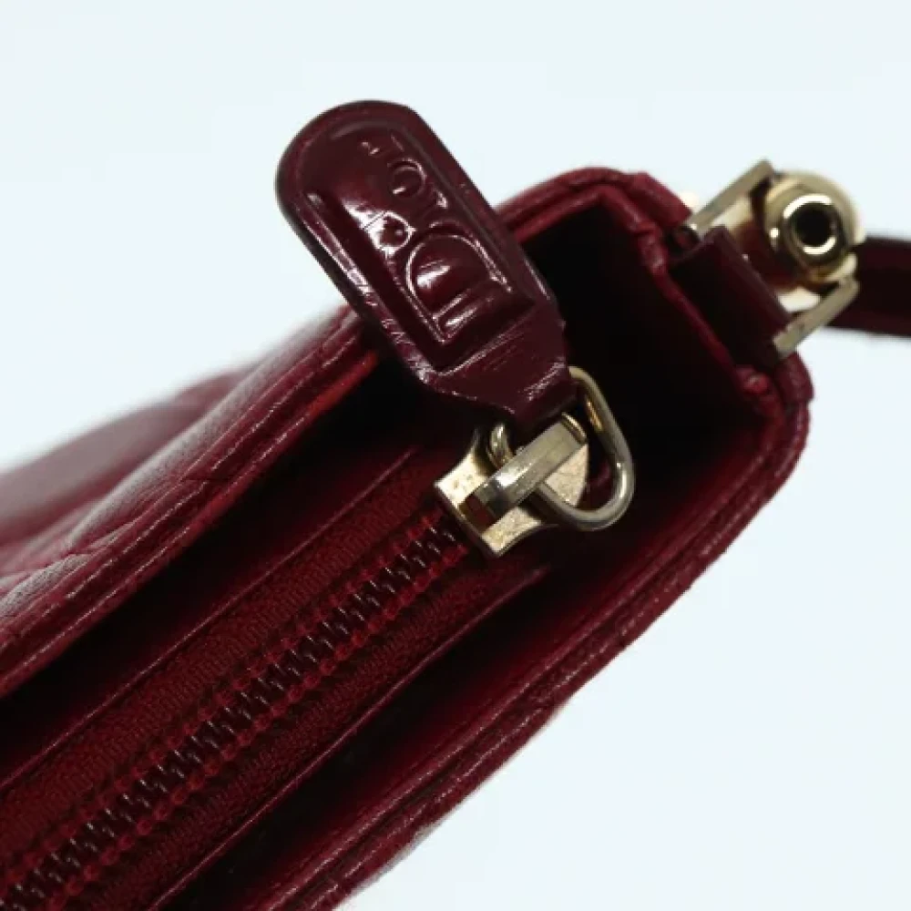 Dior Vintage Pre-owned Leather clutches Red Dames